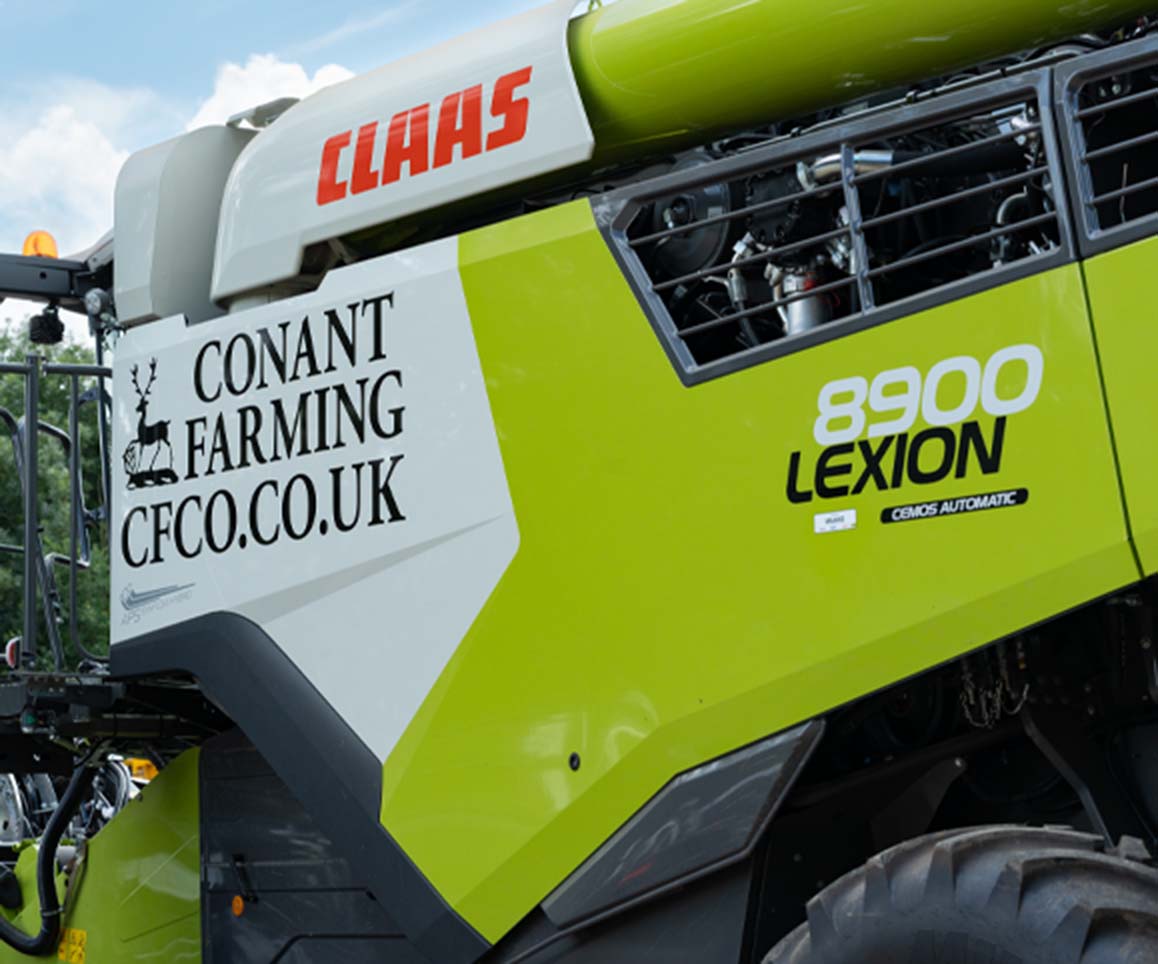 Claas Lexion 8900 Combine (790hp/581kW) - This shiny new machine is pictured just logo'd & ready for its first harvest.
