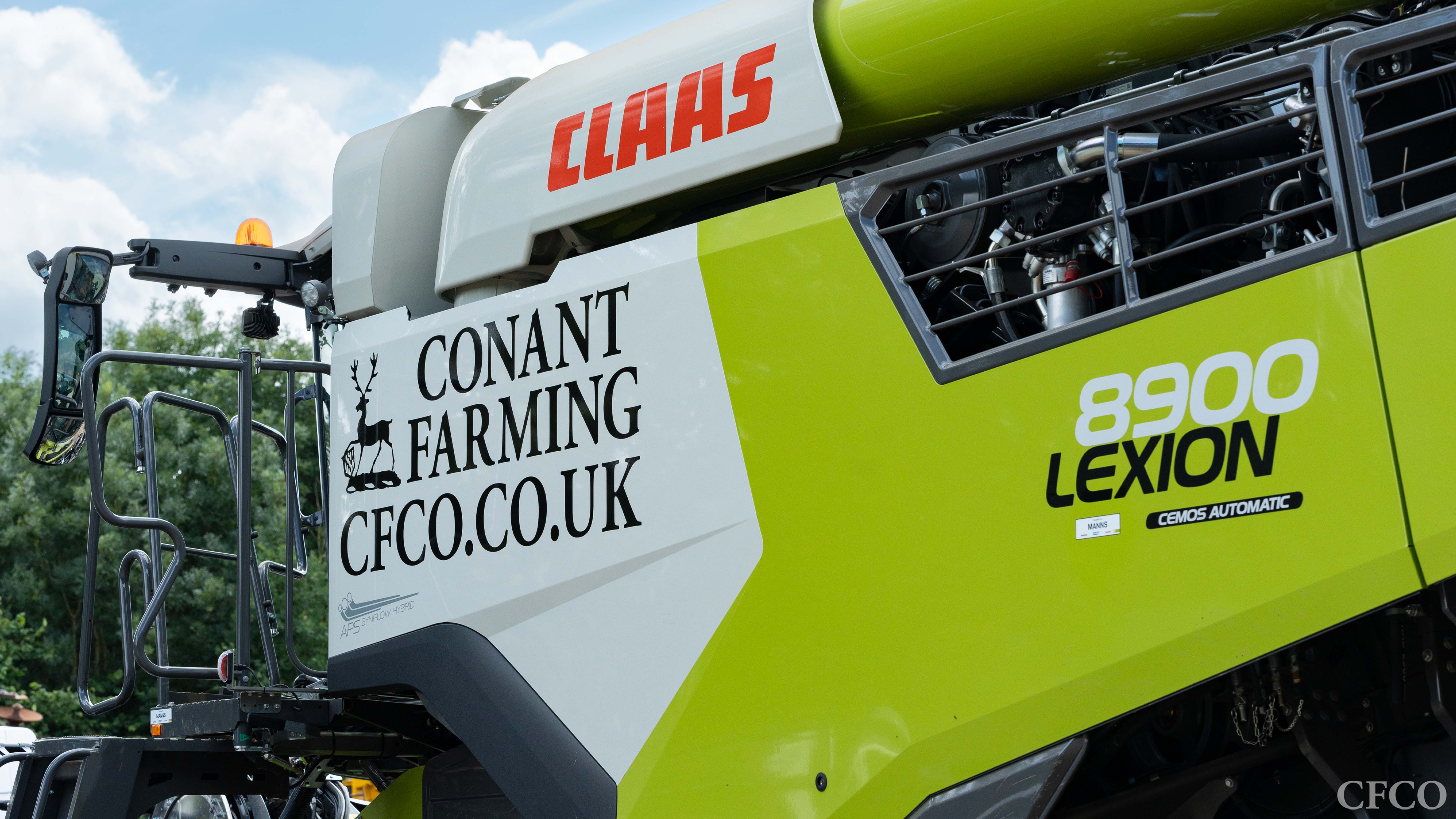 Claas Lexion 8900 Combine (790hp/581kW) - This shiny new machine is pictured just logo'd & ready for its first harvest.