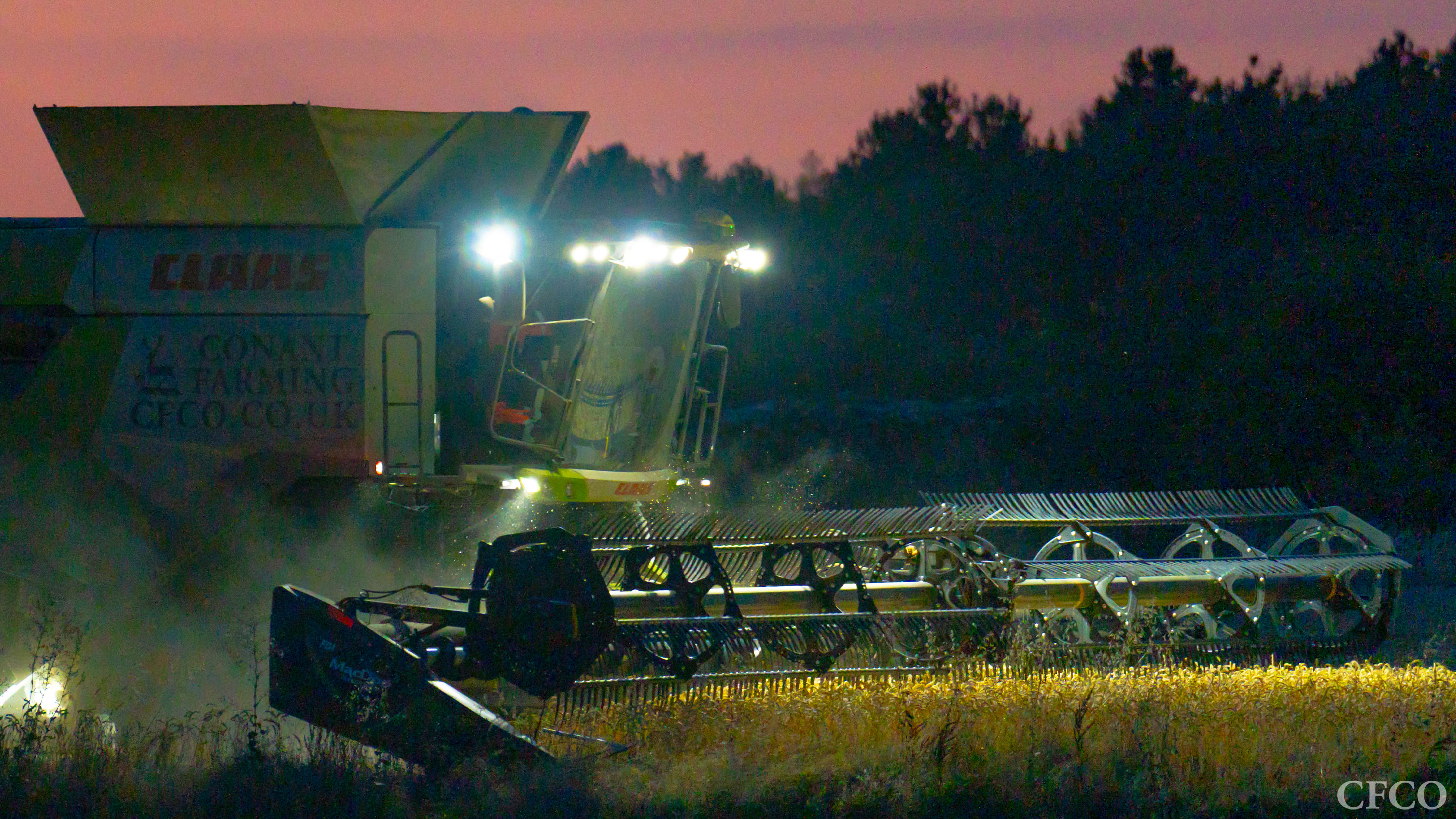 Tom harvesting into the night getting headlands cut following a spectacular sunset in Northamptonshire.