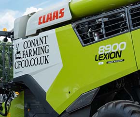 Claas Lexion 8900 Combine (790hp/581kW) - This shiny new machine is pictured just logo'd & ready for its first harvest.